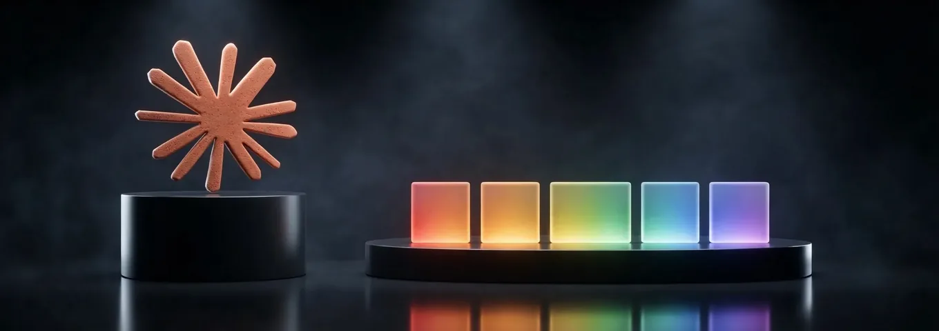 A terracotta Claude starburst on a tall black plinth beside a row of small rainbow glass tiles on a low plinth, five of them glowing warmly, in a charcoal studio with white rim light.