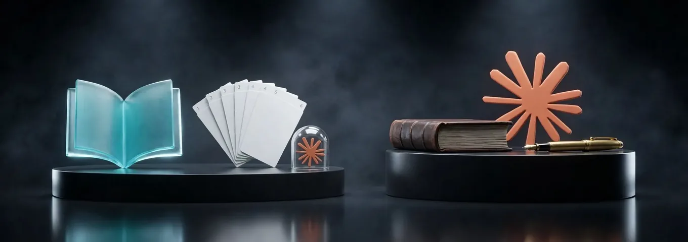 Two black plinths in a dark studio: on the left a turquoise glass open book beside a fan of numbered index cards and a tiny terracotta Claude starburst under a glass dome, on the right a large terracotta Claude starburst beside a leather manuscript and a brass fountain pen.